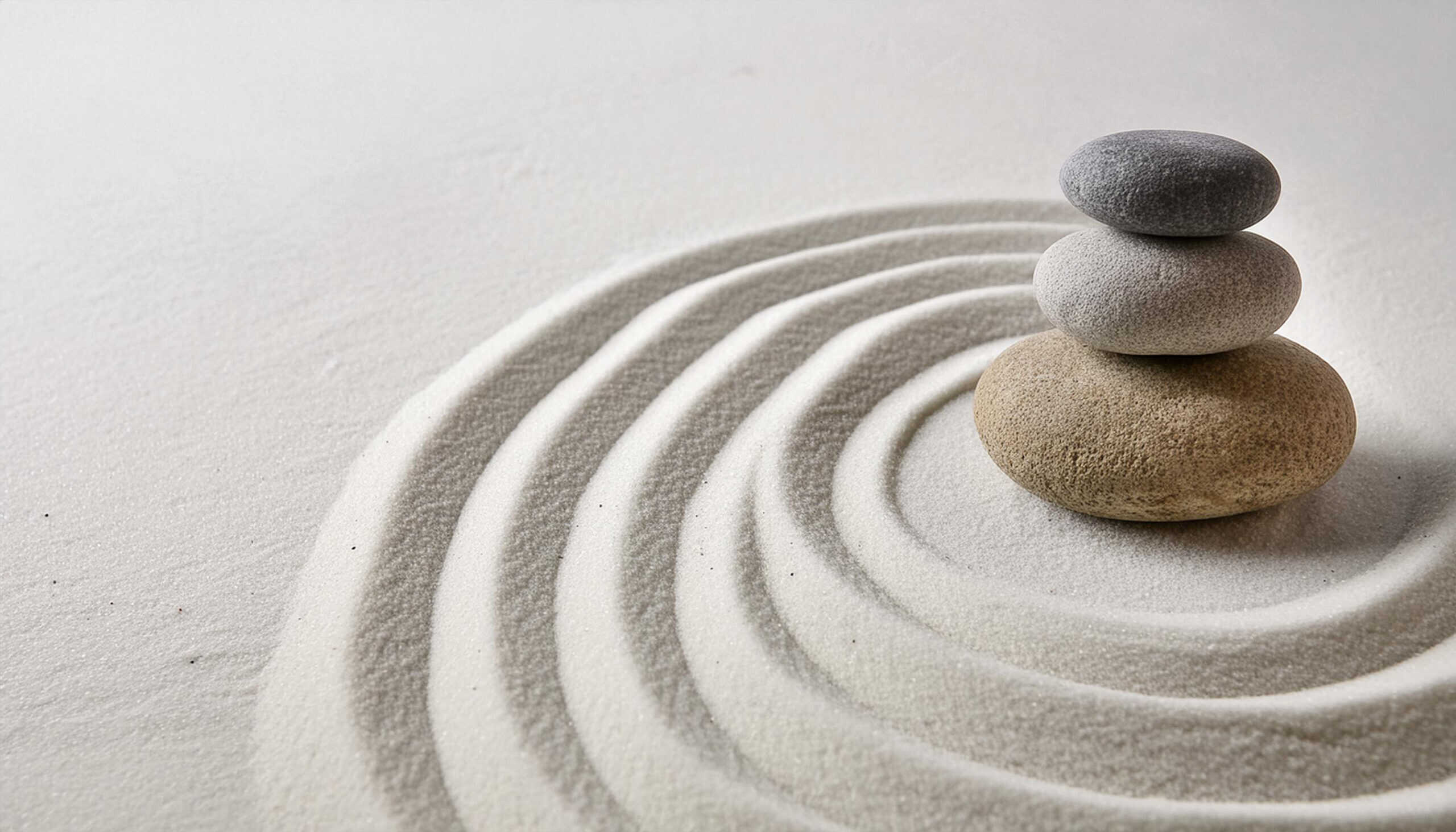 Energetische behandelingen Zen garden with the stones and white sand pattern minimal scene Stack of Balanced Pebbles, zen pebbles, relax, massage, meditation, studio photography Resy Simonis - Eigenaar, Energetische behandelingen